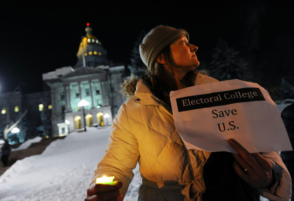 Anti-Trump protesters gather as Electoral College votes