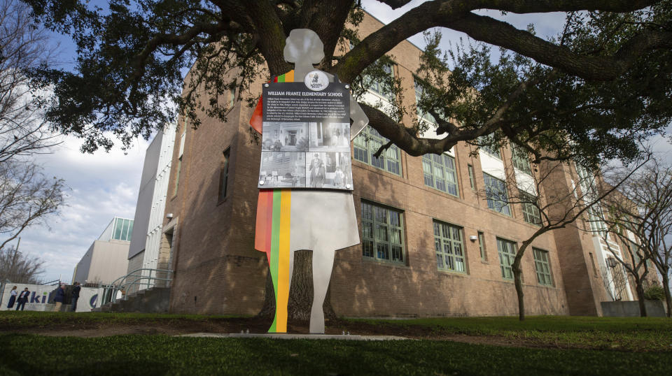 A new Civil Rights Trail marker is unveiled at William T. Frantz Elementary School, now named Akili Academy, where Ruby Bridges attended and made Civil Right history, in New Orleans on Thursday, Jan. 12, 2023. (David Grunfeld/The Times-Picayune/The New Orleans Advocate via AP)