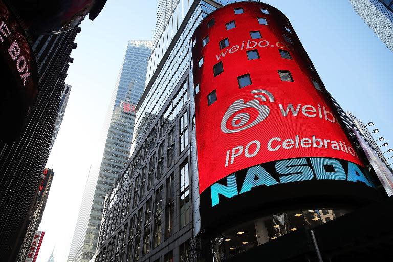 The Nasdaq exchange advertises China's Weibo in Times Square moments before it began trading on the Nasdaq exchange under the ticker symbol WB on April 17, 2014 in New York City