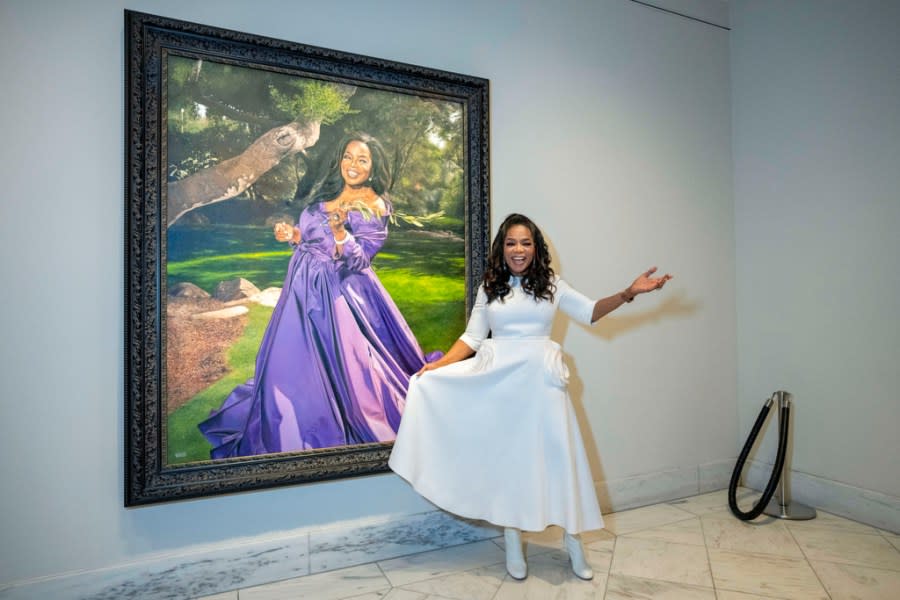 Oprah Winfrey stands next to her newly installed portrait in the Smithsonian’s National Portrait Gallery, Wednesday, Dec. 13, 2023, during a portrait unveiling ceremony in Washington. (AP Photo/Jacquelyn Martin)