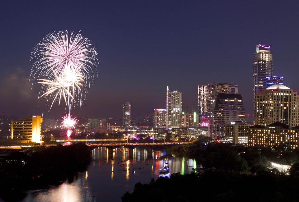 Fireworks explode over downtown Austin, Texas,on Thursday, July 4, 2013. (AP Photo/Austin American-Statesman, Jay Janner)