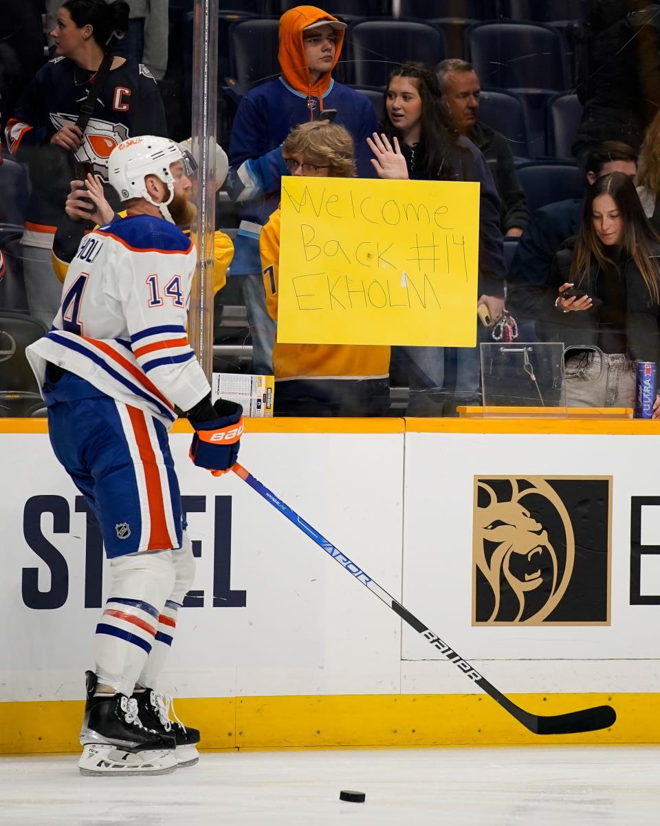 Edmonton Oilers defenseman Mattias Ekholm (14) warms up before a game against the Nashville Predators at Bridgestone Arena in Nashville, Tenn., Tuesday, Oct. 17, 2023.