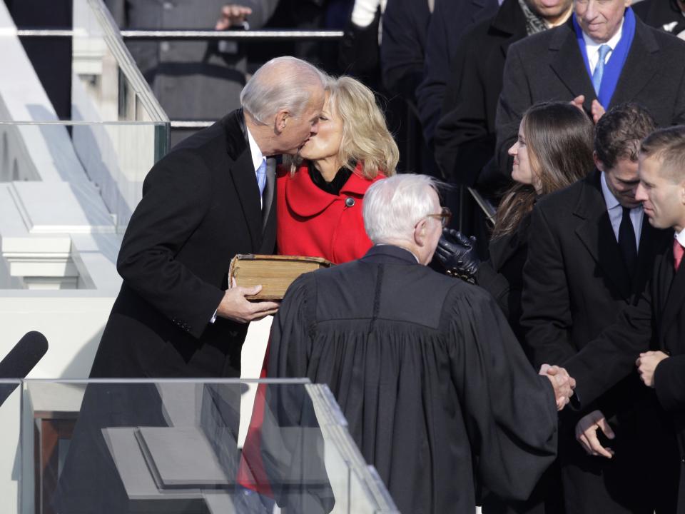 Joe Biden kisses Jill Biden after taking the oath of office to become vice president in 2009.