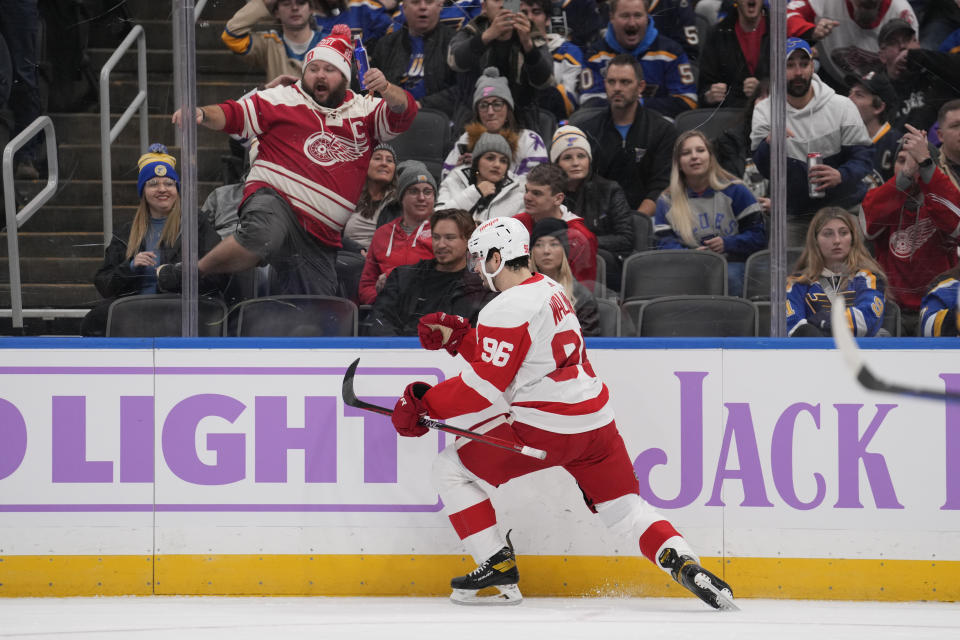 Detroit Red Wings' Jake Walman (96) celebrates after scoring during the first period of an NHL hockey game against the St. Louis Blues Tuesday, Dec. 12, 2023, in St. Louis. (AP Photo/Jeff Roberson)