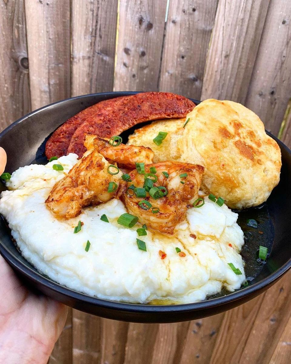 Parmesan grits with Cajun grilled shrimp, hot honey, andouille and a buttermilk biscuit from Almost Home General, the fifth location of which will open in October in Atlantic Highlands.