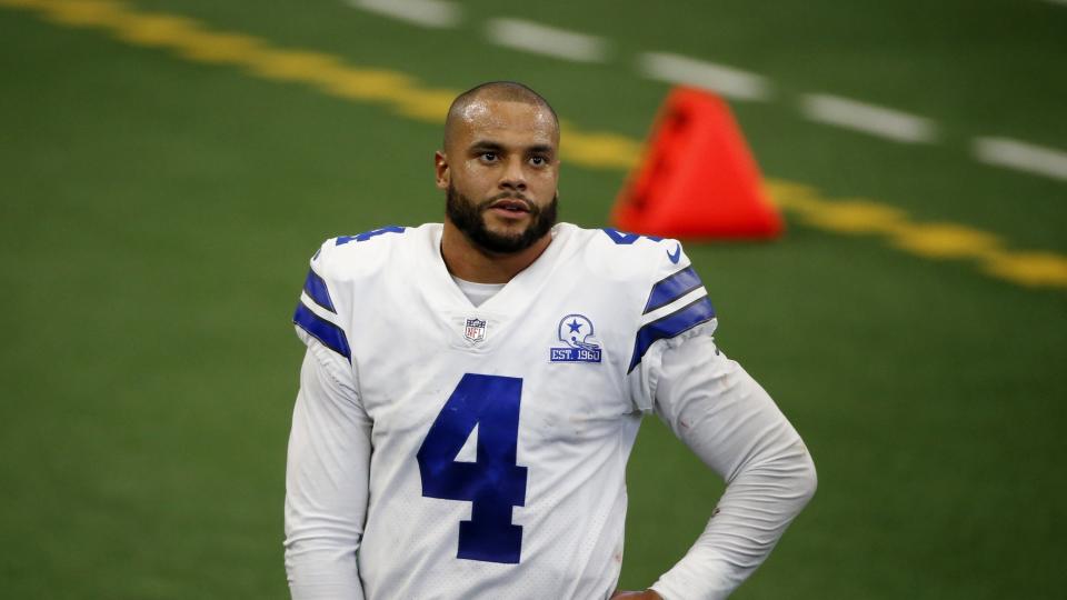 Dallas Cowboys quarterback Dak Prescott (4) stands on the field in the second half of an NFL football game against the Atlanta Falcons in Arlington, Texas, Sunday, Sept. 20, 2020. (AP Photo/Michael Ainsworth)