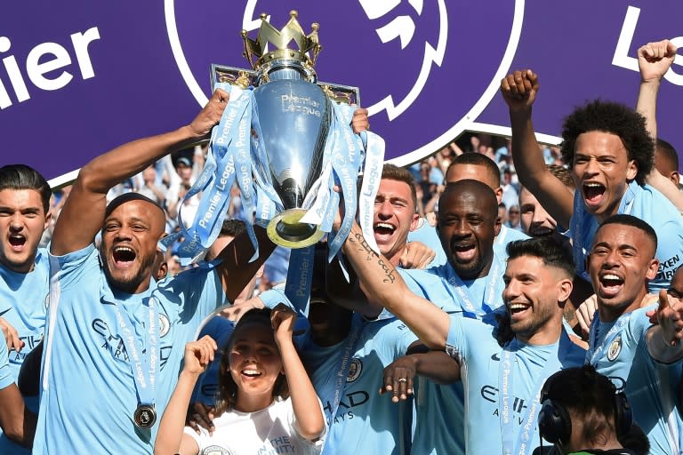 Manchester City players celebrate their 2017/18 Premier League title triumph