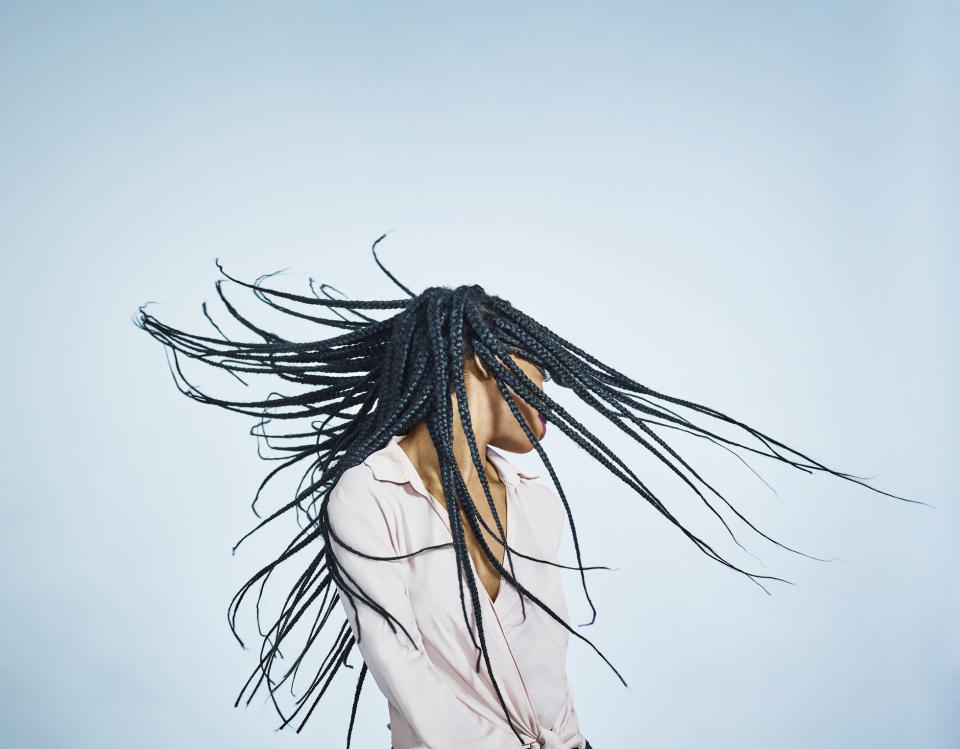 Many West African women use hair braiding as way to contribute to their family's income. (Photo: Getty)