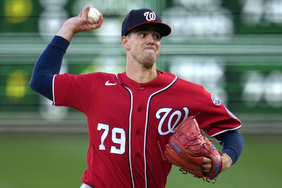 Washington Nationals starting pitcher Jackson Rutledge delivers during the first inning of the team's baseball game against the Pittsburgh Pirates, his debut in the majors, in Pittsburgh on Wednesday, Sept. 13, 2023. (AP Photo/Gene J. Puskar)