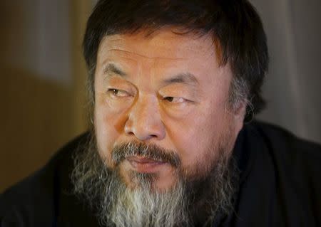 Dissident Chinese artist Ai Weiwei speaks during an interview with Reuters at the hotel he is staying at in Beijing, March 24, 2015. REUTERS/Kim Kyung-Hoon