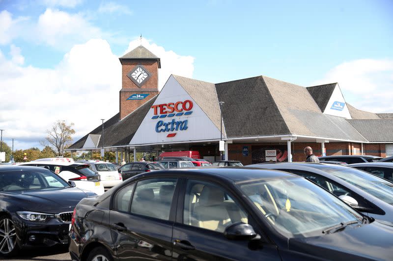 FILE PHOTO: Vehicles are pictured outside a Tesco supermarket in Hatfield