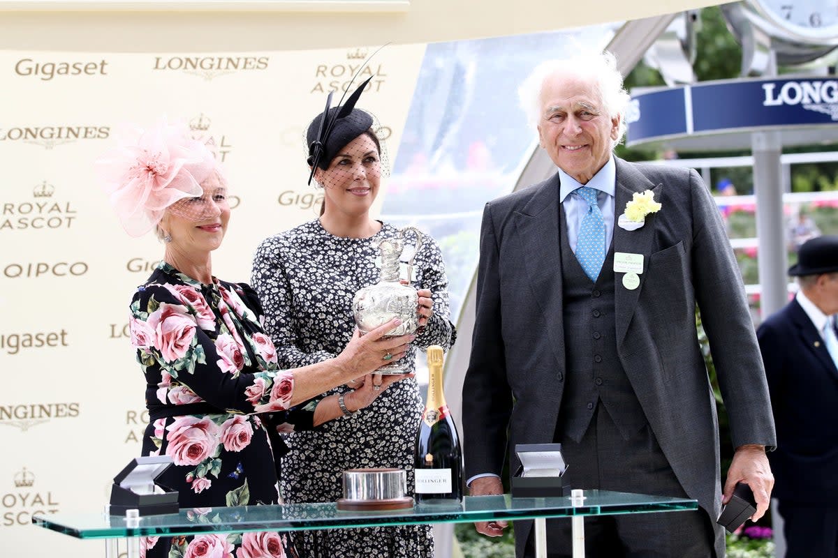 Dame Helen Mirren presents owner Sir Evelyn de Rothschild (right) and Jessica de Rothschild with a trophy after Crystal Ocean wins the Hardwicke Stakes during day five of 2018 Royal Ascot at Ascot Racecourse (John Walton/PA) (PA Archive)