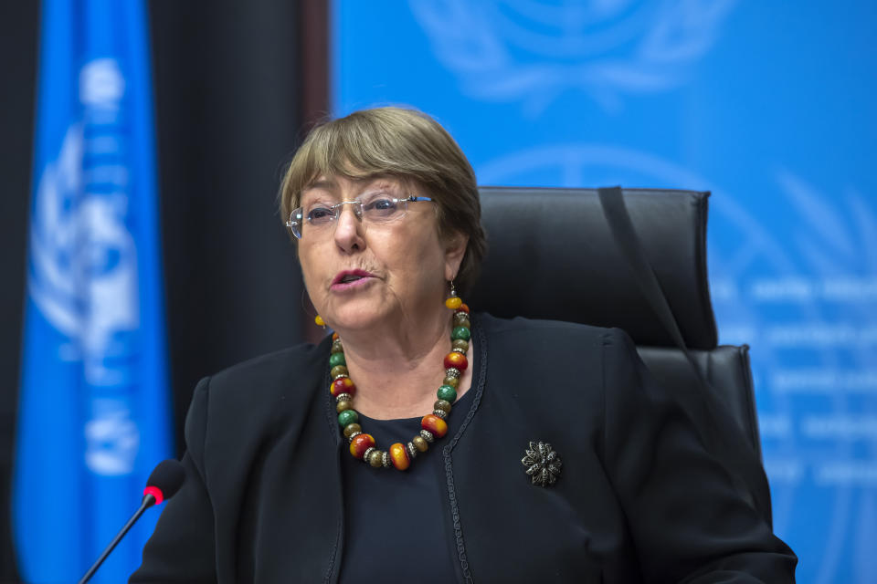 FILE - Michelle Bachelet, UN High Commissioner for Human Rights, speaks during a news conference at the European headquarters of the United Nations in Geneva, Switzerland, on Dec. 9, 2020. Allegations of human rights abuses in China's northwestern Xinjiang region are the dominant issue on a visit by the United Nations' top rights official that starts Monday, May 23, 2022. (Martial Trezzini/Keystone via AP, File)