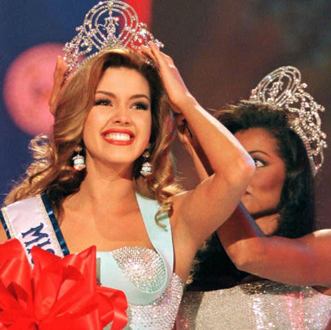 Miss Venezuela, Alicia Machado smiles after winning the 1996 ''Miss Universe'' crown in Las Vegas, Nevada, U.S. In a May 17, 1996 - Credit: STEVE MARCUS/ Reuters