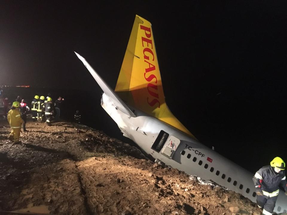 <p>A Pegasus airplane carrying 162 passengers is seen stuck in mud as it skidded off the runway after landing in Trabzon Airport, Turkey early Sunday on Jan. 14, 2018.(Photo: Tugba Yardimci/Anadolu Agency/Getty Images) </p>