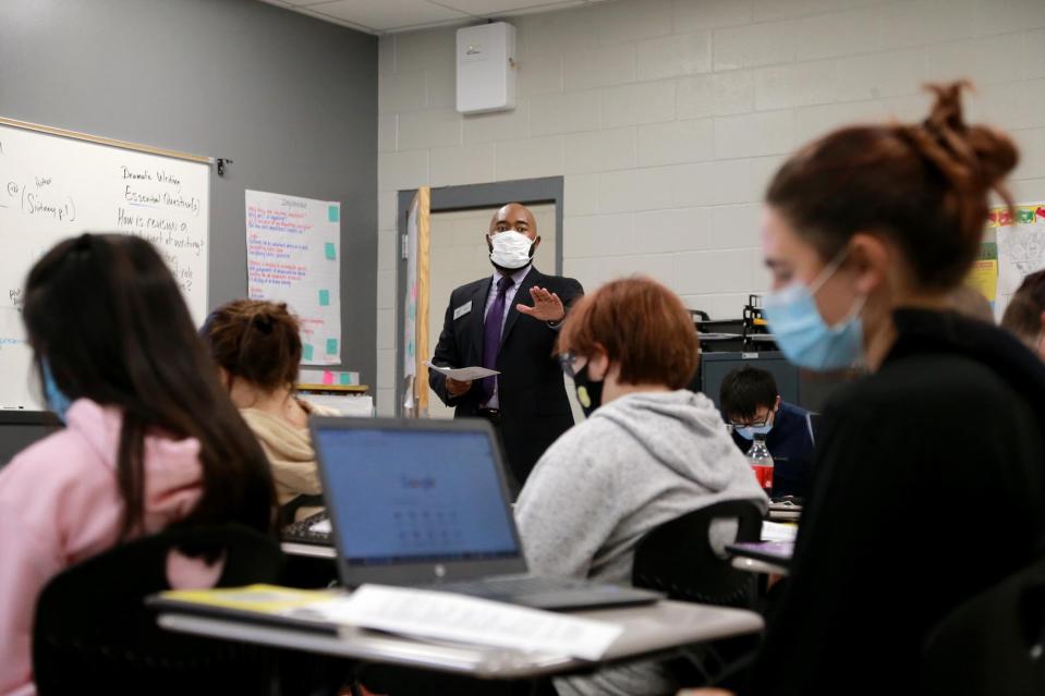 In this file photo, English Language Arts teacher Paul Sidney goes over a lesson with his class at Jenkins High. The new divisive concepts law in Georgia prohibits teachers from interjecting their personal and political beliefs into a classroom setting.