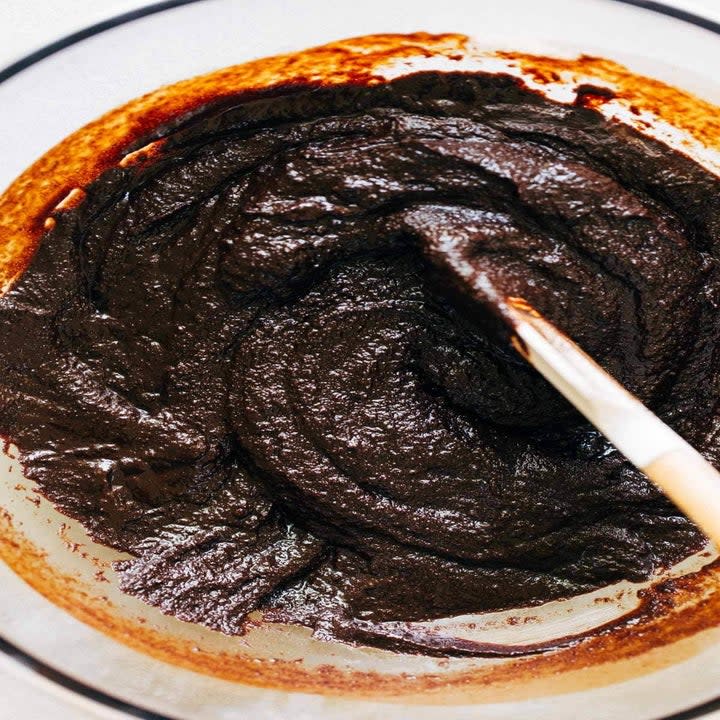 Chocolate cake batter in a bowl.