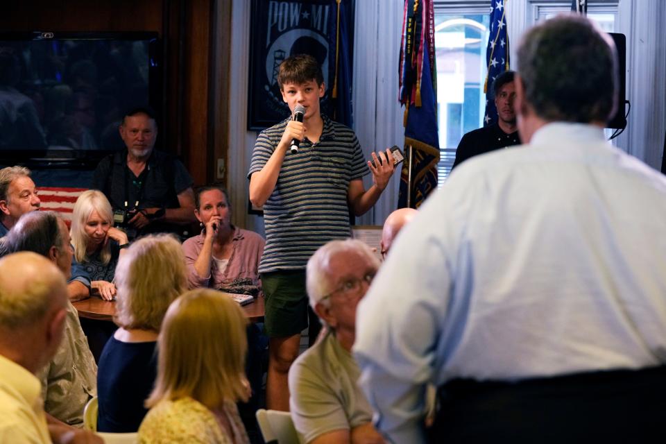 Student Quinn Mitchell, of Walpole, N.H. asks a question to Republican presidential candidate former New Jersey Gov. Chris Christie during a campaign event at V.F.W. Post 1631, Monday, July 24, 2023, in Concord, N.H.