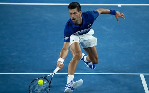 Novak Djokovic of Serbia hits a backhand to Daniil Medvedev of Russia during day eight of the 2019 Australian Open at Melbourne Park on January 21, 2019 in Melbourne, Australia - Credit: Getty Images&nbsp;