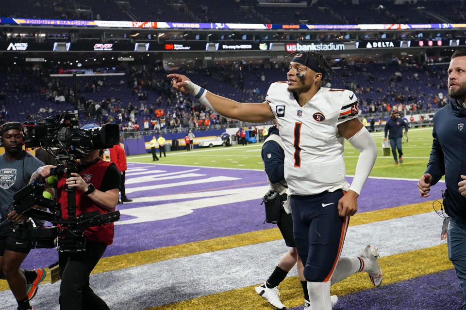 Chicago Bears quarterback Justin Fields (1) runs off the field after an NFL football game against the Minnesota Vikings, Monday, Nov. 27, 2023, in Minneapolis. The Bears won 12-10. (AP Photo/Abbie Parr)