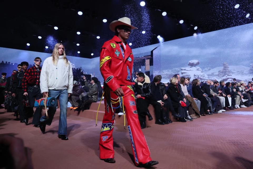 TOPSHOT - Models present creations for the Louis Vuitton Menswear Ready-to-wear Fall-Winter 2024/2025 collection as part of the Paris Fashion Week, in Paris on January 16, 2024. (Photo by Alain JOCARD / AFP) (Photo by ALAIN JOCARD/AFP via Getty Images) ORG XMIT: 776085021 ORIG FILE ID: 1930879652