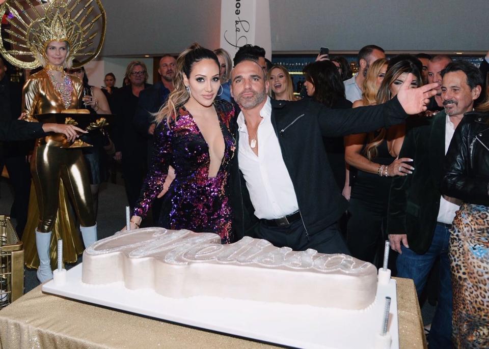 <em>Cake Boss</em> Buddy Valastro baked a beautiful birthday cake for Gorga. Wrapped in gold fondant, the cake had reality star's first name written on it in siver glittery cursive. 