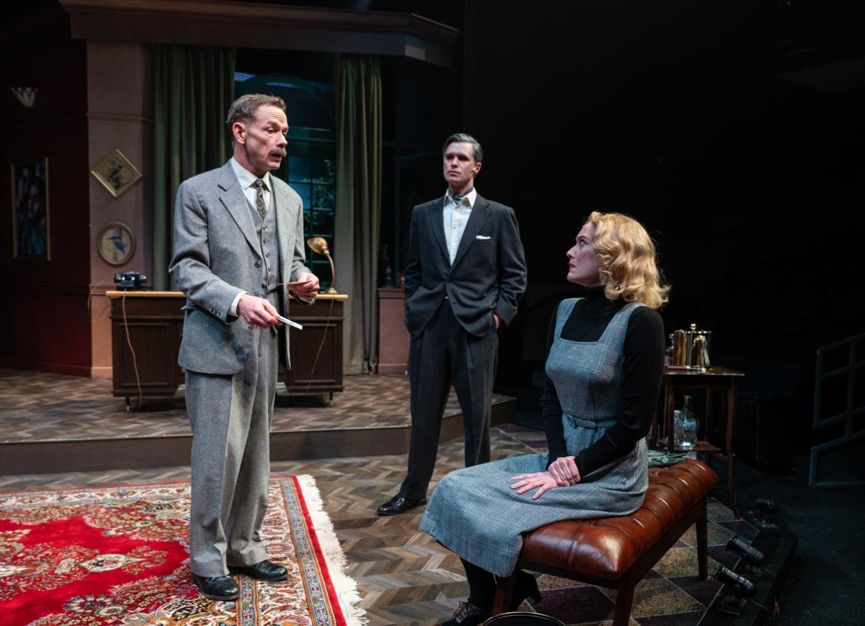Jonathan Wainwright, Marcus Truschinski and Amanda Drinkall perform in "Dial M for Murder," staged by Milwaukee Repertory Theater.