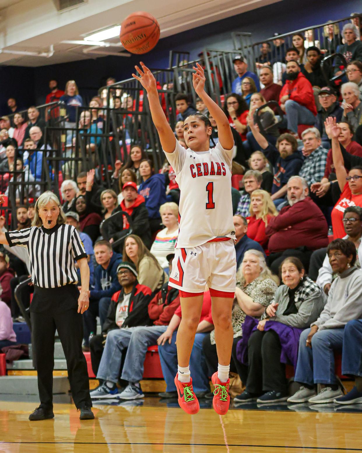 Kailah Correa (1) fires a three point shot in front of a packed house.. The Lebanon Cedars played host to the Dallastown Wildcats in a PIAA District 3 Class 6A Semi-final girls Basketball game on Monday February 26, 2024. The Wildcats came from behind and defeated the Cedars 40-34.