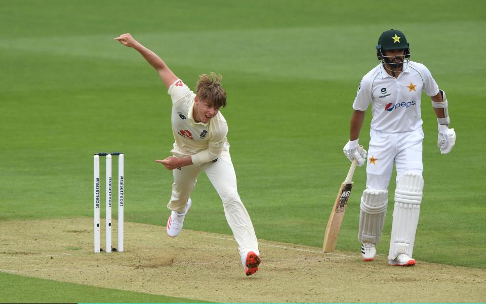 Sam Curran of England bowls watched on by Azhar Ali of Pakistan during Day One of the 2nd #RaiseTheBat Test Match between England and Pakistan at The Ageas Bowl on August 13, 2020 in Southampton, England -  Getty Images Europe