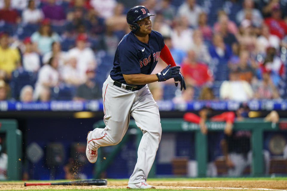 Boston Red Sox's Rafael Devers watches his RBI double during the third inning of the team's baseball game against the Philadelphia Phillies, Saturday, May 22, 2021, in Philadelphia. (AP Photo/Chris Szagola)