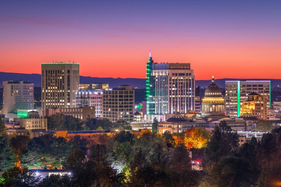 A photo of the downtown cityscape of Boise, Idaho at twilight. SeanPavonePhoto – stock.adobe.com