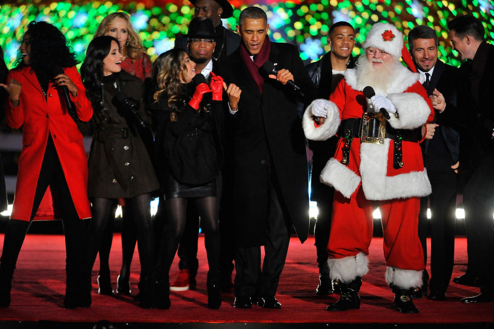 <p>President Barack Obama joins the festivities on stage to end the National Christmas Tree at the National Park Foundation and Google’s “Made with Code” National Christmas Tree Lightening Ceremony on December 4, 2014 in Washington, DC. (Larry French/Getty Images for Google) </p>