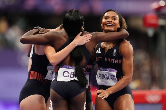 Great Britain’s Imani Lansiquot (right) celebrates with Daryll Neita, Amy Hunt and Dina Asher-Smith