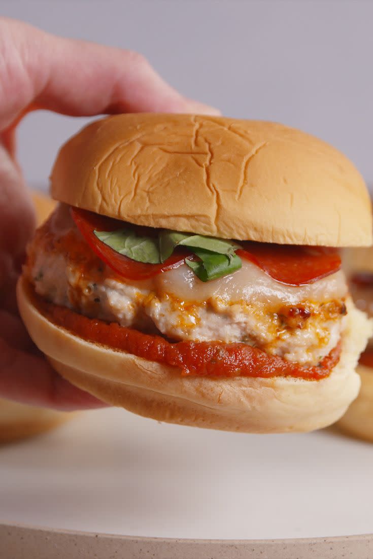 <p>Say hi to the ultimate chicken burger upgrade.</p><p>Get the recipe from <a href="https://www.delish.com/cooking/recipe-ideas/recipes/a52338/chicken-pizza-burgers/" rel="nofollow noopener" target="_blank" data-ylk="slk:Delish;elm:context_link;itc:0;sec:content-canvas" class="link ">Delish</a>.</p>