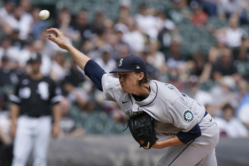 Seattle Mariners starting pitcher Logan Gilbert throws against the Chicago White Sox during the first inning of a baseball game in Chicago, Saturday, June 26, 2021. (AP Photo/Nam Y. Huh)