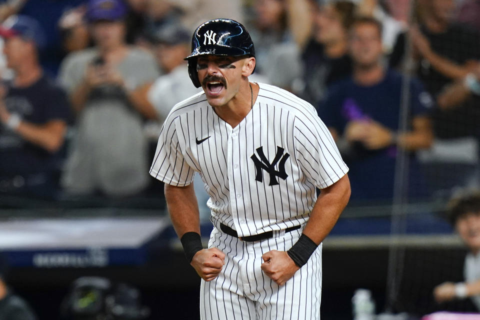 New York Yankees' Matt Carpenter celebrates after scoring on a two-run home run by Gleyber Torres during the eighth inning of the team's baseball game against the Cincinnati Reds on Thursday, July 14, 2022, in New York. (AP Photo/Frank Franklin II)
