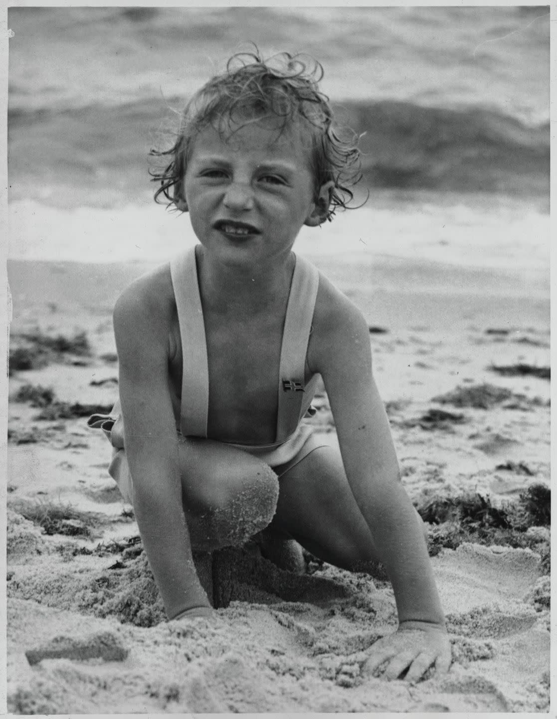 prince harald playing on beach