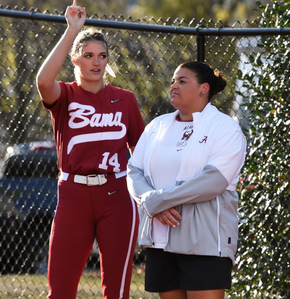 Alabama pitcher Montana Fouts talks with pitching coach Stephanie VanBrakle Prothro in the bull pen before the game with Florida State. The Crimson Tide fell short in a 6-5 loss to Florida State Wednesday, March 16, 2022, in Rhoads Stadium.