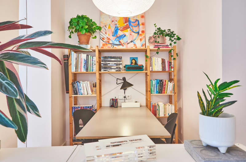 Bookshelf in office area of apartment.