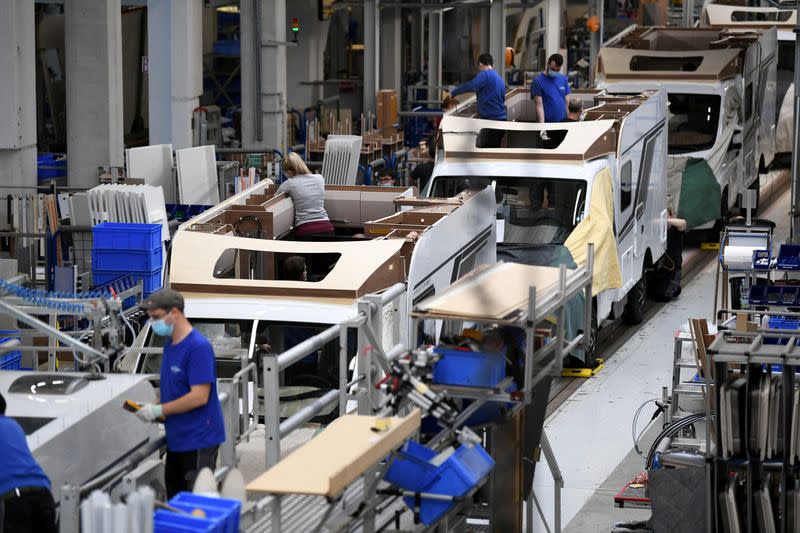 FILE PHOTO: Workers assemble campers at Knaus-Tabbert AG factory in Jandelsbrunn