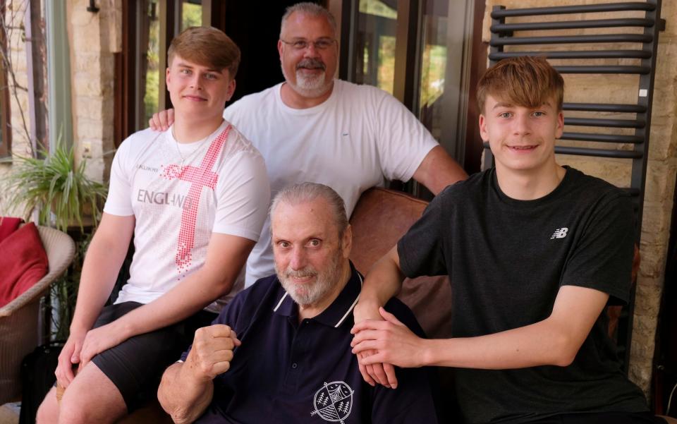 Geoff Capes (centre) with his grandson Lawson (right), his other grandson Donovan, and their father Lewis