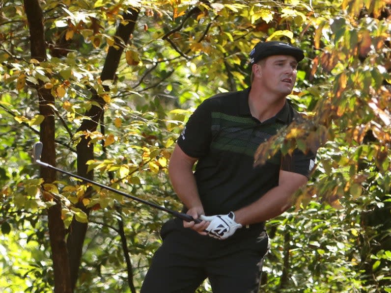 DeChambeau hits out of the tree at Augusta in 2020Getty Images