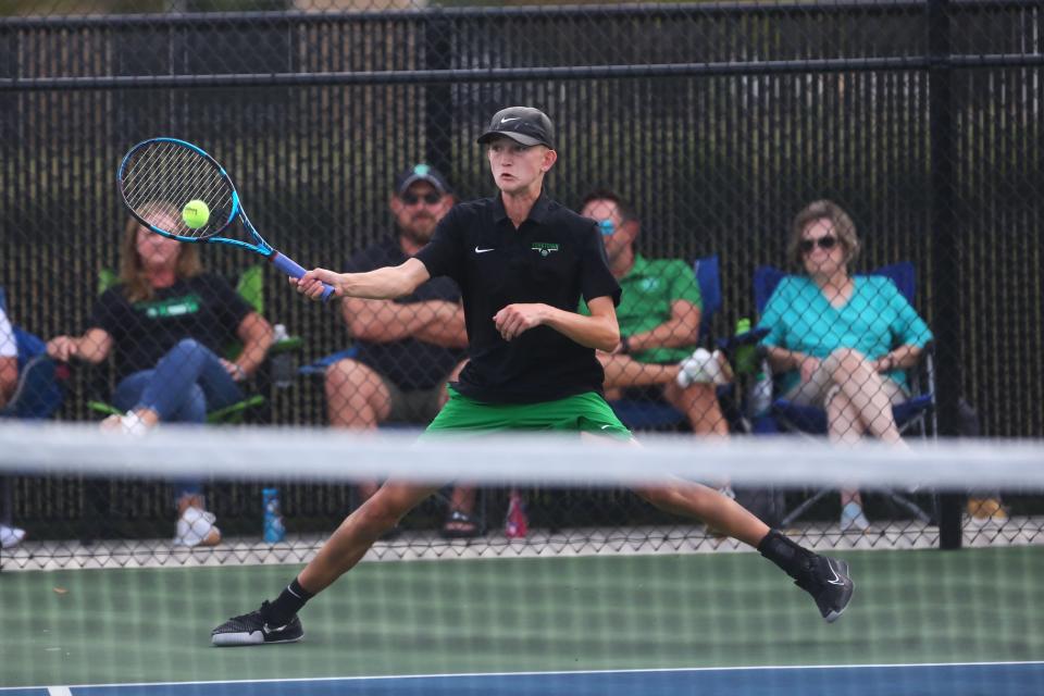 Yorktown boys tennis' Anson Isaacs in his individual state tournament matchup at Noblesville High School on Wednesday, October 4, 2023.