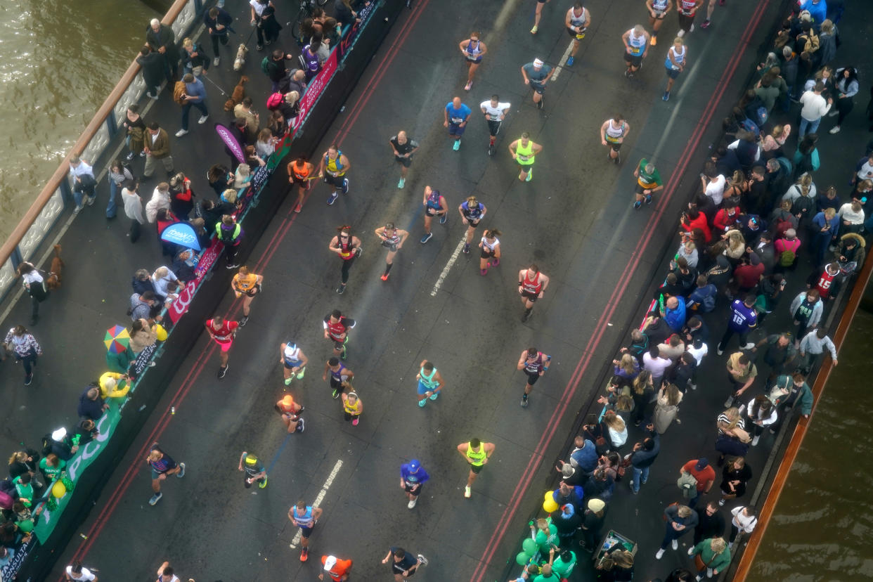 Runners make their way over Tower Bridge during the TCS London Marathon. Picture date: Sunday October 2, 2022. (Photo by Kirsty O'Connor/PA Images via Getty Images)
