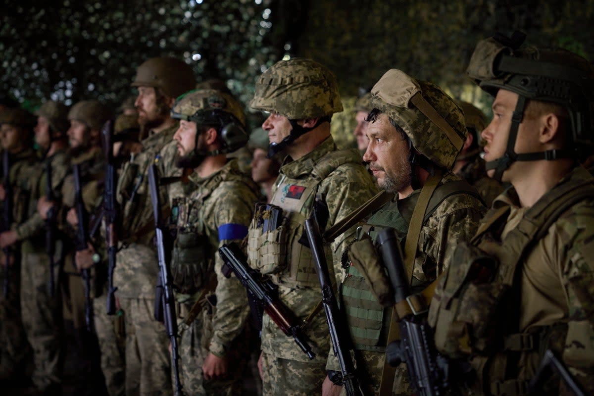 Ukrainian servicemen during a visit by Ukraine’s President Zelensky at a frontline position in the Berdyansk direction, Ukraine, 26 June 2023 (EPA/Ukrainian Presidential Press Service)