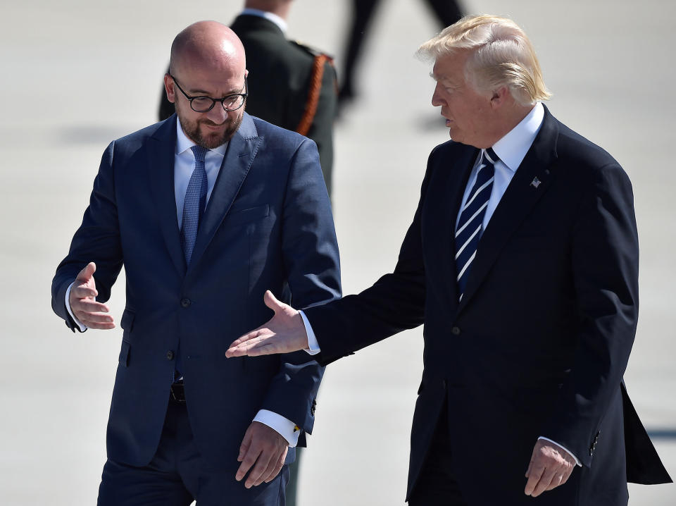 <p>President Donald Trump (R) and Belgian Prime Minister Charles Michel shake hands at the Brussels Airport in Brussels, Belgium, May 24, 2017. (Photo: Hannah McKay/Reuters) </p>