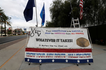 A sign is shown outside the federal courthouse as jury selection begins for Nevada rancher Cliven Bundy, two of his sons and co-defendant Ryan Payne, in Las Vegas, Nevada, U.S. October 30, 2017. REUTERS/Las Vegas Sun/Steve Marcus