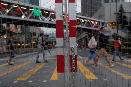 A barricade set up by anti-government protesters is pictured during a protest in Tsuen Wan, near the site where police shot a protester with live ammunition on China's National Day in Hong Kong