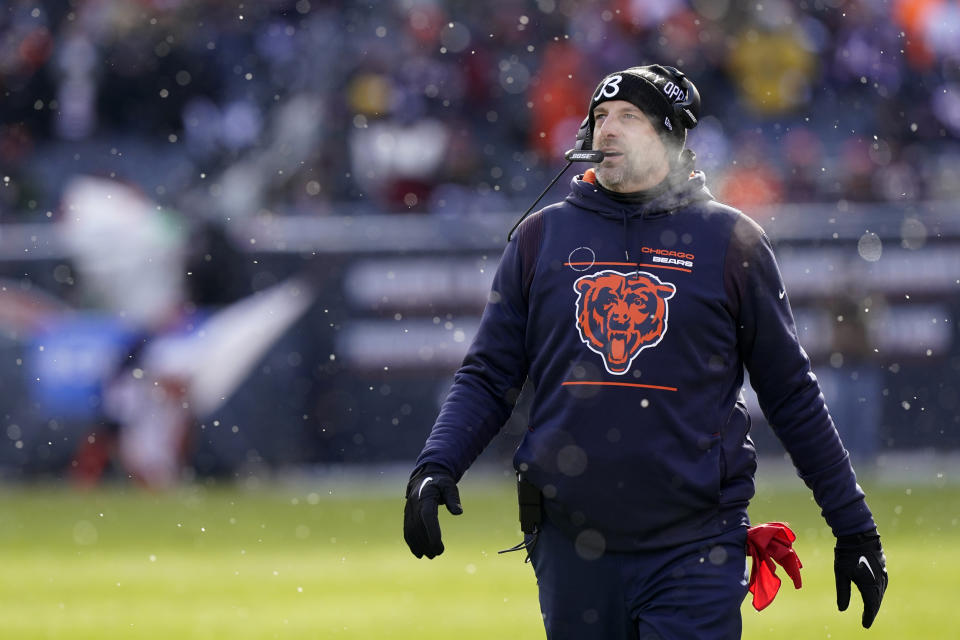 Chicago Bears head coach Matt Nagy exhales in the cold air as he walks the sideline during the first half of an NFL football game against the New York Giants Sunday, Jan. 2, 2022, in Chicago. (AP Photo/Nam Y. Huh)