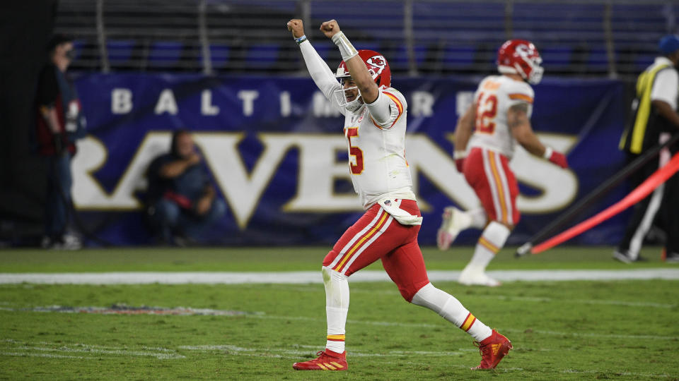 Kansas City Chiefs quarterback Patrick Mahomes celebrates his touchdown pass to offensive tackle Eric Fisher during the second half of an NFL football game against the Baltimore Ravens, Monday, Sept. 28, 2020, in Baltimore. In three previous meetings with Kansas City's Patrick Mahomes, the Patriots defense has had its most success when it's been able to force turnovers and get pressure on him. But that's easier said than done against a quarterback who has yet commit a turnover this season and is completing a career-high 68% of his passes. (AP Photo/Nick Wass, File)